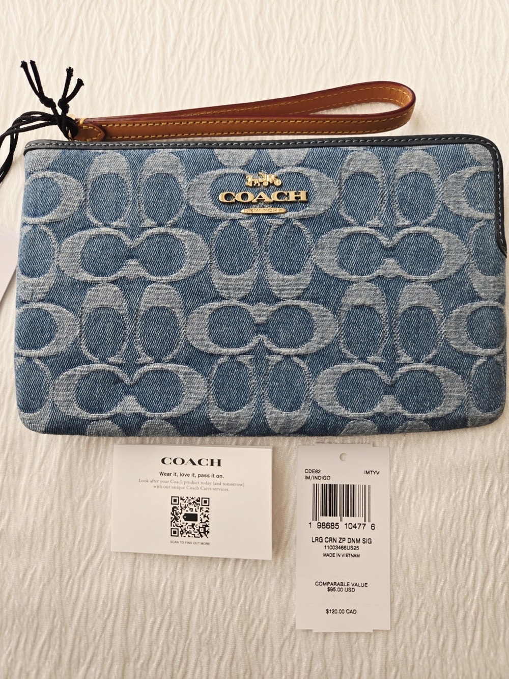 Coach Large Corner Zip Wristlet
In Signature Denim